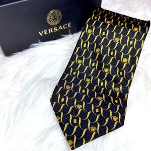 Gianni Versace Medusa Heads Tie on Black Background